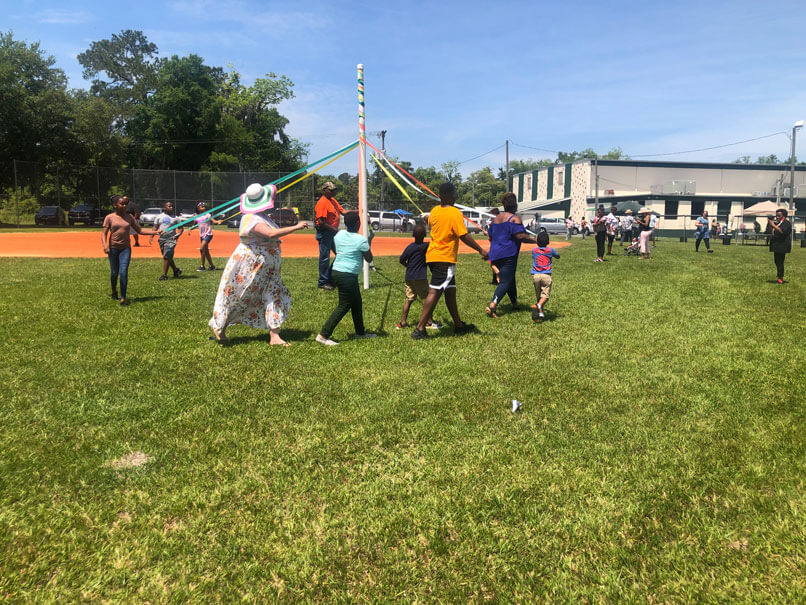 Elana Ramos joined in the Maypole Dance